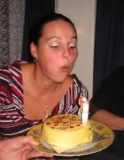 Amanda gets ready to blow....out the candles on her birthday cake.
