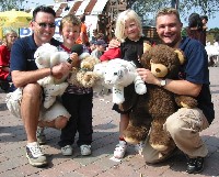 The winners with their cuddly prizes. No not Brian and Lee I'm talking about the fluffy white tigers...