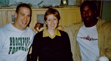 Rheinfire footballer's Jason Johnson and Derrick Ham together with BFBS listener Ireen Young...