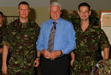WO2 Jim Sutherland pictured with Sir Bobby Robson and Cpl Glen Gittings. Taken when Newcastle United visited Butmir Camp, Sarajevo. [August 2002]